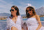 Two fashion influencers in white bikinis and white beach cover-ups from luxury swimwear brand Leyla Maya - enjoying a yacht day party in Marbella 
